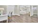 Bedroom with hardwood floors, desk, and view of Primary bedroom at 1201 Roma Rd, Hanahan, SC 29410