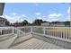 Spacious deck with white railing and backyard view at 1201 Roma Rd, Hanahan, SC 29410