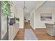 Bright and airy entryway with hardwood floors and a console table at 1201 Roma Rd, Hanahan, SC 29410