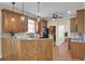 Modern kitchen with wooden cabinets, granite countertops and stainless steel appliances at 1201 Roma Rd, Hanahan, SC 29410
