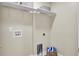 Laundry room with white shelves and hookups for washer and dryer at 1201 Roma Rd, Hanahan, SC 29410