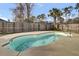 Kidney-shaped pool in a fenced backyard at 1201 Roma Rd, Hanahan, SC 29410