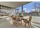 Screened porch with table and chairs overlooking the pool at 1201 Roma Rd, Hanahan, SC 29410