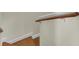 Wooden staircase with a simple, modern handrail at 1201 Roma Rd, Hanahan, SC 29410