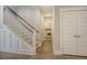 Staircase leading down to the basement laundry and storage at 128 Sandy Bend Ln, Summerville, SC 29486