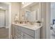 Double vanity bathroom with modern gray cabinets at 128 Sandy Bend Ln, Summerville, SC 29486