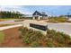 Midtown Club community clubhouse with welcoming front porch and landscaping at 128 Sandy Bend Ln, Summerville, SC 29486