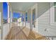 Upstairs deck with white railings and light blue ceiling at 128 Sandy Bend Ln, Summerville, SC 29486