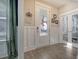 Bright entryway with white door and wood flooring at 128 Sandy Bend Ln, Summerville, SC 29486