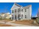 Two-story craftsman home with front porch and landscaping at 128 Sandy Bend Ln, Summerville, SC 29486