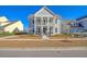 Two-story craftsman home with front porch and landscaping at 128 Sandy Bend Ln, Summerville, SC 29486