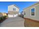 Two car garage with driveway and additional storage at 128 Sandy Bend Ln, Summerville, SC 29486