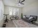 Home office with a comfortable couch and exercise equipment at 128 Sandy Bend Ln, Summerville, SC 29486