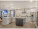 Open concept kitchen with large island, stainless steel appliances, and white cabinets at 128 Sandy Bend Ln, Summerville, SC 29486