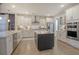 Modern kitchen with a large island, stainless steel appliances, and white cabinets at 128 Sandy Bend Ln, Summerville, SC 29486