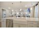 Kitchen features a farmhouse sink, stainless steel appliances, and white cabinetry at 128 Sandy Bend Ln, Summerville, SC 29486