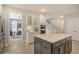 Modern kitchen with island, stainless steel appliances, and white cabinets at 128 Sandy Bend Ln, Summerville, SC 29486