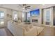 Relaxing living room with a cozy sectional sofa and a modern fireplace at 128 Sandy Bend Ln, Summerville, SC 29486