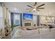 Spacious living room features a sectional sofa, fireplace, and built-in TV at 128 Sandy Bend Ln, Summerville, SC 29486