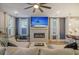 Bright living room with fireplace, comfy sectional sofa, and large TV at 128 Sandy Bend Ln, Summerville, SC 29486