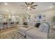 Open concept living room with kitchen island and sectional sofa at 128 Sandy Bend Ln, Summerville, SC 29486