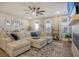 Spacious living room featuring a sectional sofa and fireplace at 128 Sandy Bend Ln, Summerville, SC 29486