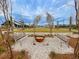 Relaxing community park with benches and fire pit at 128 Sandy Bend Ln, Summerville, SC 29486