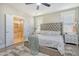 Main bedroom with ensuite bathroom access and cozy sitting area at 128 Sandy Bend Ln, Summerville, SC 29486