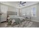 Elegant main bedroom with plush bed, large windows, and a vanity at 128 Sandy Bend Ln, Summerville, SC 29486