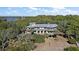 Multi-level home with expansive decks and waterfront access at 153 Dewees Inlet Dr, Dewees Island, SC 29451