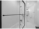 Modern bathroom with white tile and black accents at 153 Dewees Inlet Dr, Dewees Island, SC 29451
