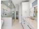 Spa-like bathroom with marble shower, soaking tub, and modern fixtures at 153 Dewees Inlet Dr, Dewees Island, SC 29451