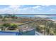 Elevated wooden deck offers scenic waterfront views at 153 Dewees Inlet Dr, Dewees Island, SC 29451