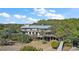 Multi-level home with large deck overlooking marsh and water views at 153 Dewees Inlet Dr, Dewees Island, SC 29451
