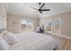 Spacious main bedroom with water views and private deck access at 153 Dewees Inlet Dr, Dewees Island, SC 29451
