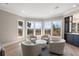 Cozy sitting area with comfy chairs and expansive water views at 153 Dewees Inlet Dr, Dewees Island, SC 29451