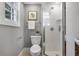 Small bathroom with a stand-up shower and gray walls at 157 Line St, Charleston, SC 29403