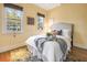 Bright bedroom with hardwood floors, featuring a comfy bed and natural light at 157 Line St, Charleston, SC 29403