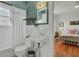 Charming bathroom with white subway tile, pedestal sink, and updated fixtures at 186 Sans Souci St, Charleston, SC 29403