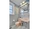 Retro bathroom with pink fixtures and patterned wallpaper at 186 Sans Souci St, Charleston, SC 29403