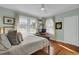 Spacious bedroom with hardwood floors and sunny windows at 186 Sans Souci St, Charleston, SC 29403