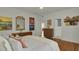 Main bedroom with hardwood floors and mid-century dresser at 186 Sans Souci St, Charleston, SC 29403