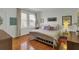 Bright bedroom with hardwood floors and a metal bed frame at 186 Sans Souci St, Charleston, SC 29403
