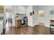 Eat-in kitchen with stainless steel appliances and hardwood floors at 186 Sans Souci St, Charleston, SC 29403