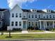 Two-story townhouses with gray siding and white accents at 191 Blueway Ave, Summerville, SC 29486
