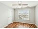 Well-lit bedroom with wood floors and ceiling fan at 2005 Isabela Ct, Summerville, SC 29483