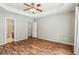 Bright bedroom featuring wood floors and en-suite bath at 2005 Isabela Ct, Summerville, SC 29483