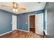 Bright bedroom featuring wood floors and ceiling fan at 2005 Isabela Ct, Summerville, SC 29483
