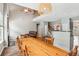 Dining room with a farmhouse table, hardwood floors, and kitchen view at 2005 Isabela Ct, Summerville, SC 29483