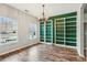Bright dining room with hardwood floors and built-in shelving at 2005 Isabela Ct, Summerville, SC 29483